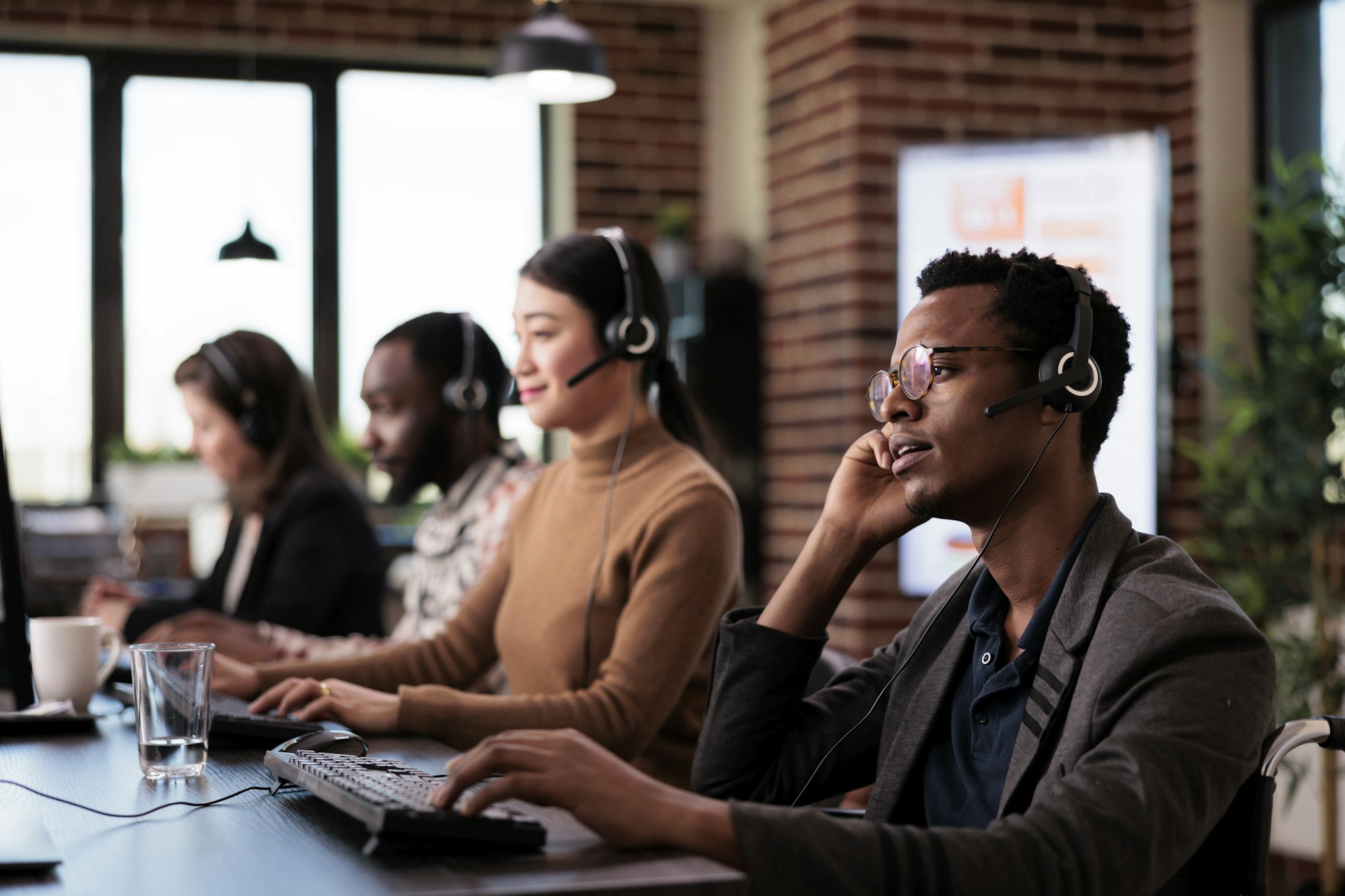 Wheelchair user and call center operator working on helpline